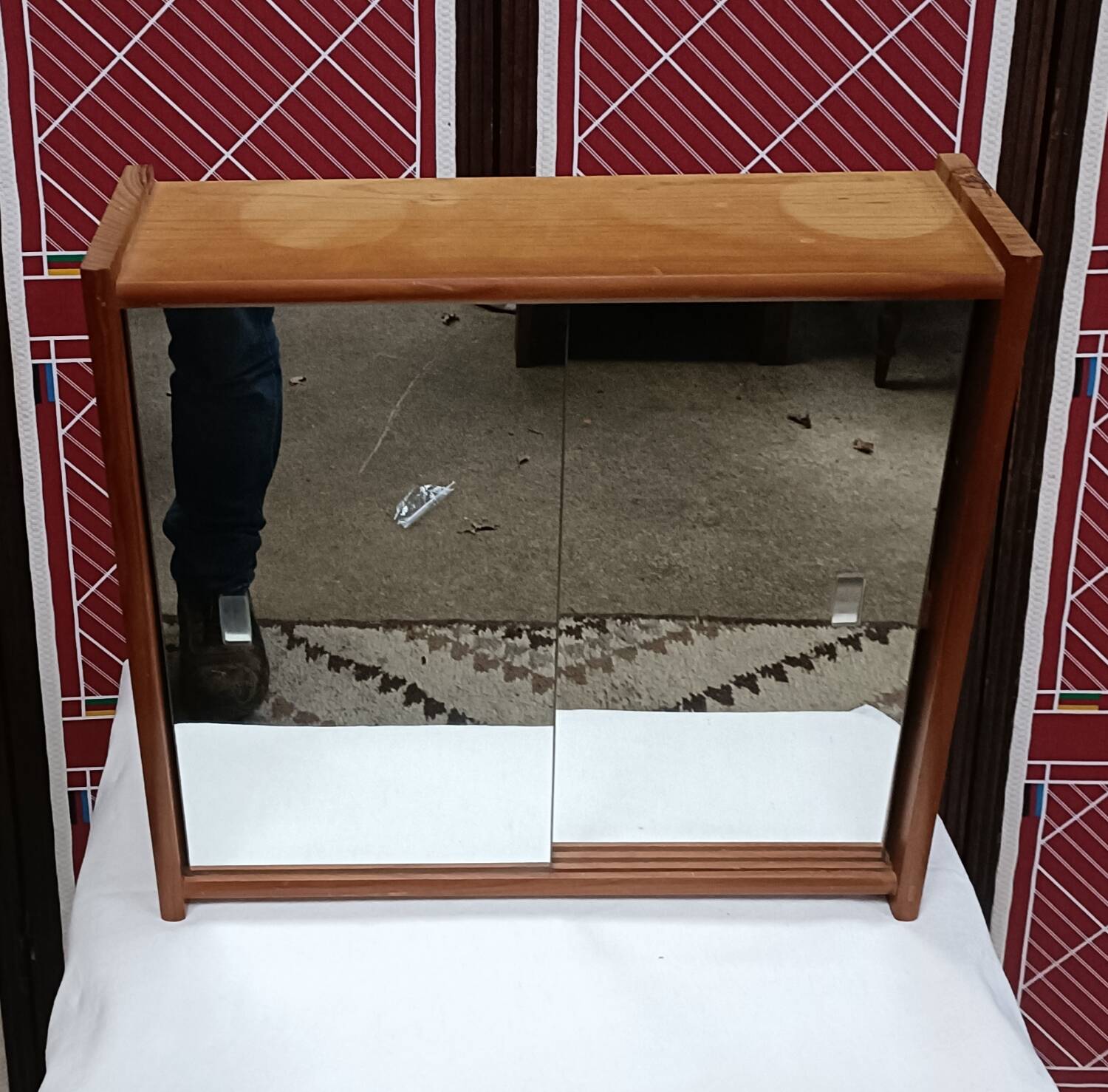 Small wall-mounted bathroom cabinet with vintage mirror doors