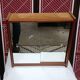 Small wall-mounted bathroom cabinet with vintage mirror doors
