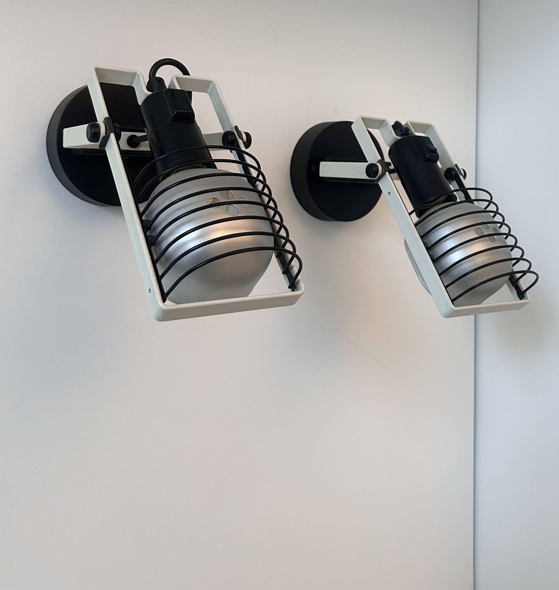 Pair of vintage Sintesi adjustable wall lights, by Gismonti for Artemide, Italy 1975