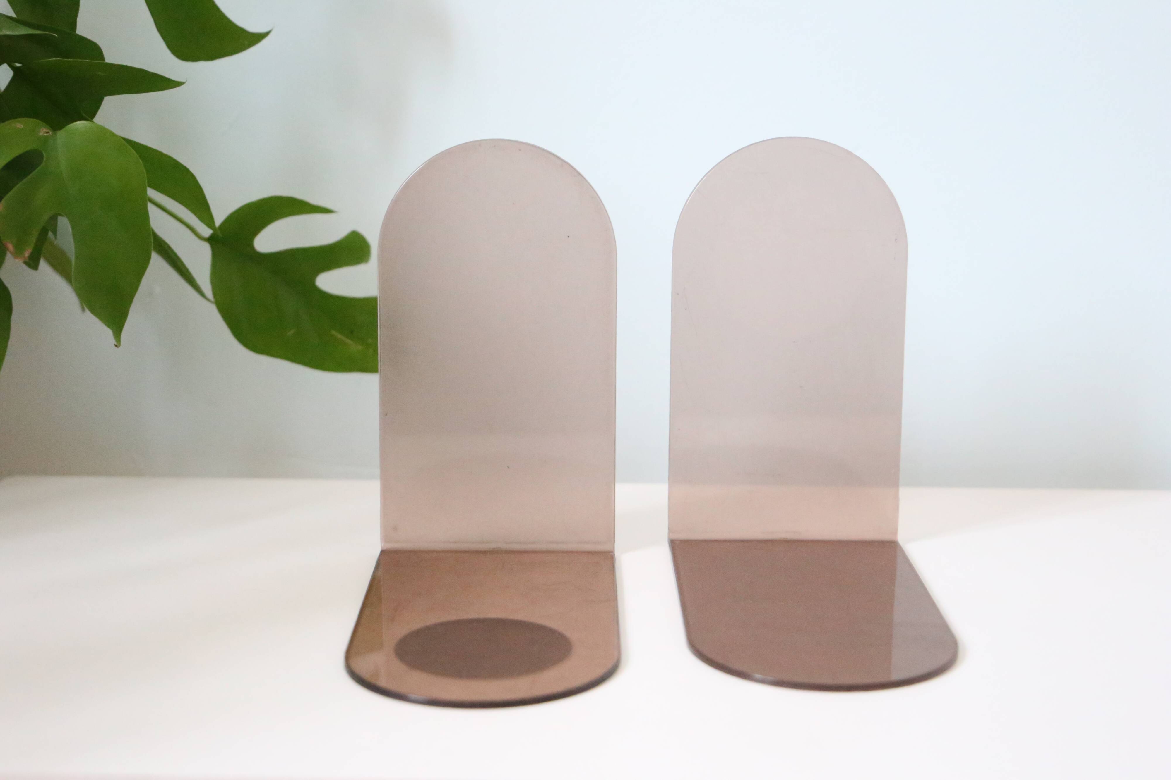 Pair of smoked plexiglass bookends, 1970s