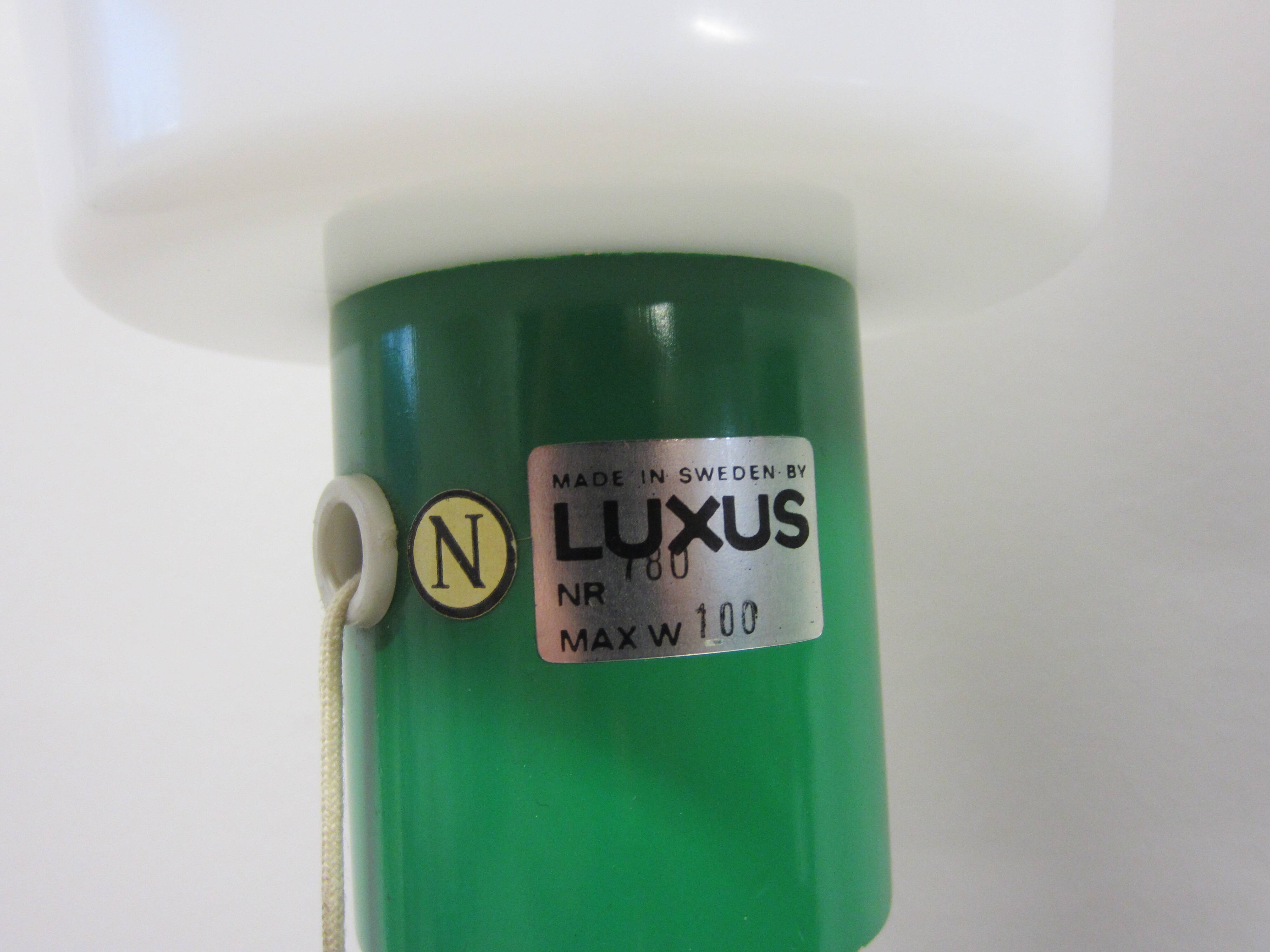 Pair of Scandinavian Luxus wall lamps by Uno and Östen Kristiansson