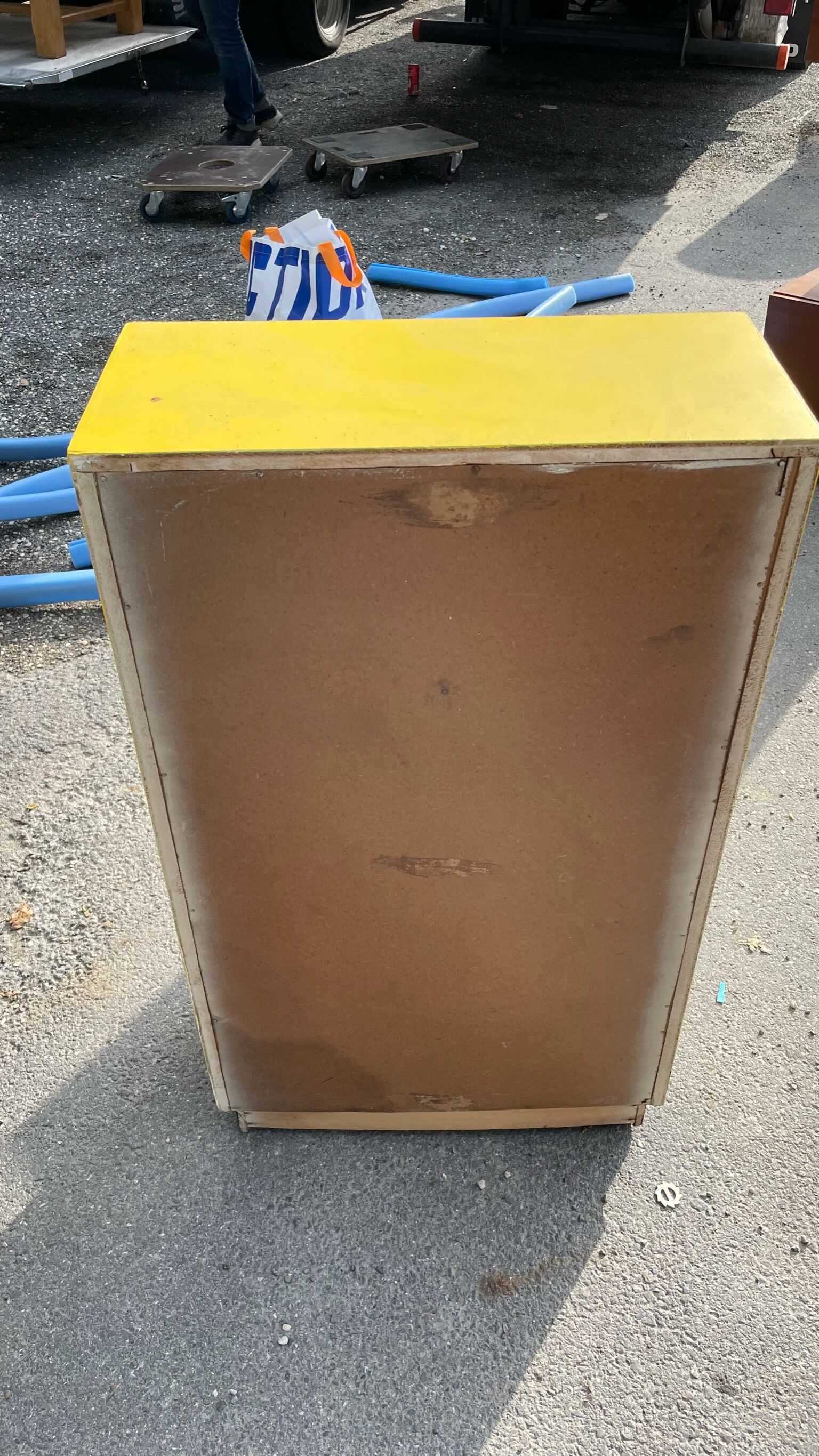 Yellow wooden chest of drawers
