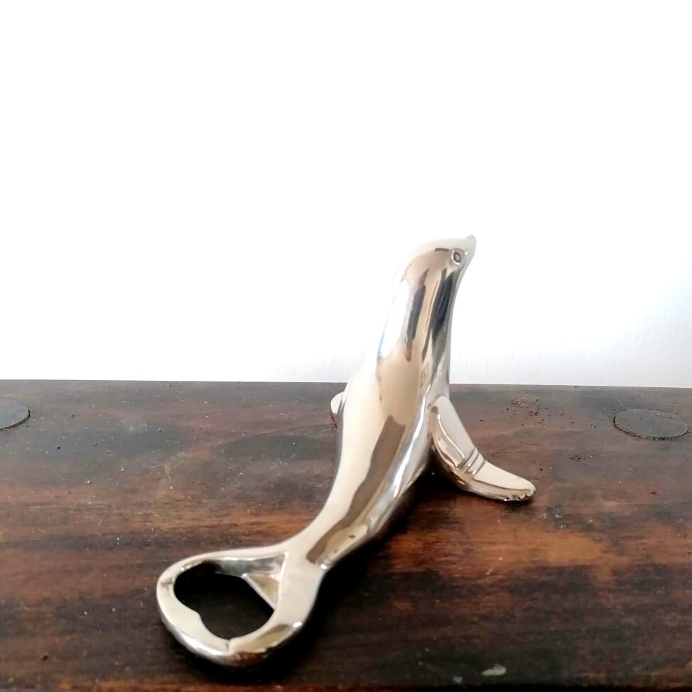 Silver metal seal bottle opener