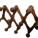 Ancien porte manteau accordéon en bois.
