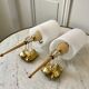 Pair of gold steel wall lamps, plexi and pleated plastic shades 60s-70s