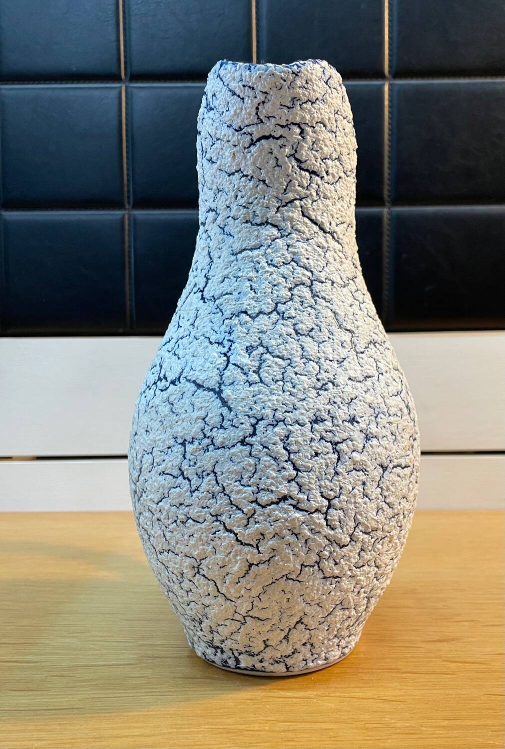 White and blue crisped ceramic pitcher