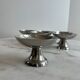Set of 6 stainless steel dessert bowls on a stand.
