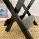 Tabouret pliable en cannage