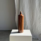 Large antique stoneware bottle with a small cork stopper