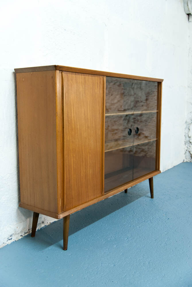 Console with sliding doors