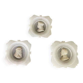 Three alabaster profiles of men, Italy around 1880
