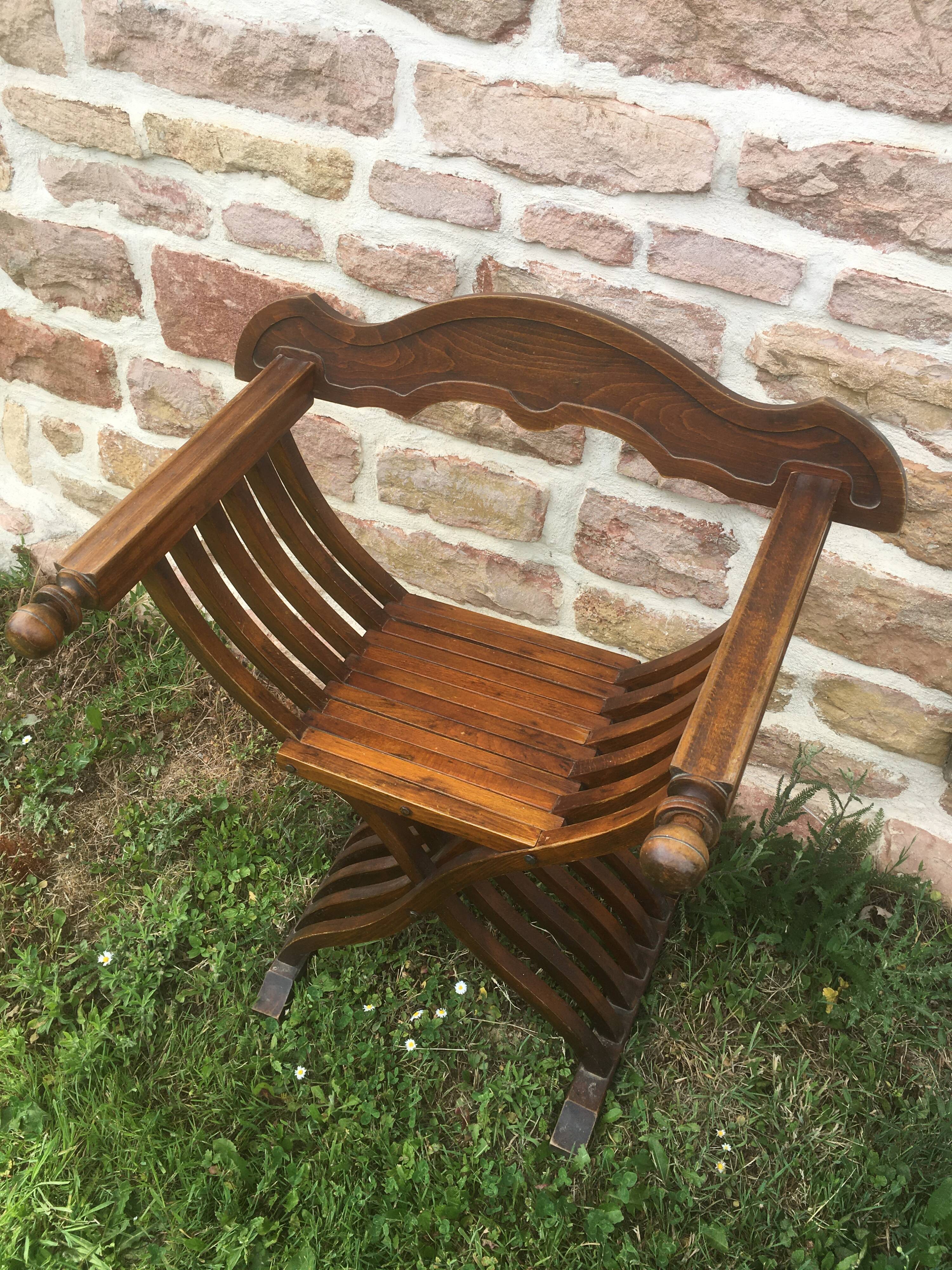 Dagobert armchair or folding walnut curule