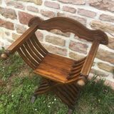 Dagobert armchair or folding walnut curule