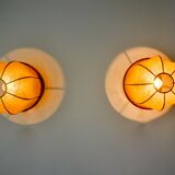 Pair of "cocoon" wall lights, resin and pine, Italy, 1970