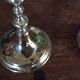 Pair of gold metal candle holders