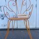 Orange wrought iron chair