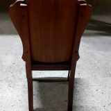 Set of 6 vintage solid wood chairs with animal motif on the back and leather seat