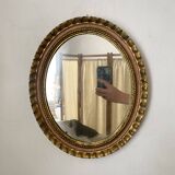 Oval Florentine mirror in powder pink and gold wood, 1960s.