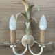 Vintage wrought iron wall sconce in the shape of a flower/leaf