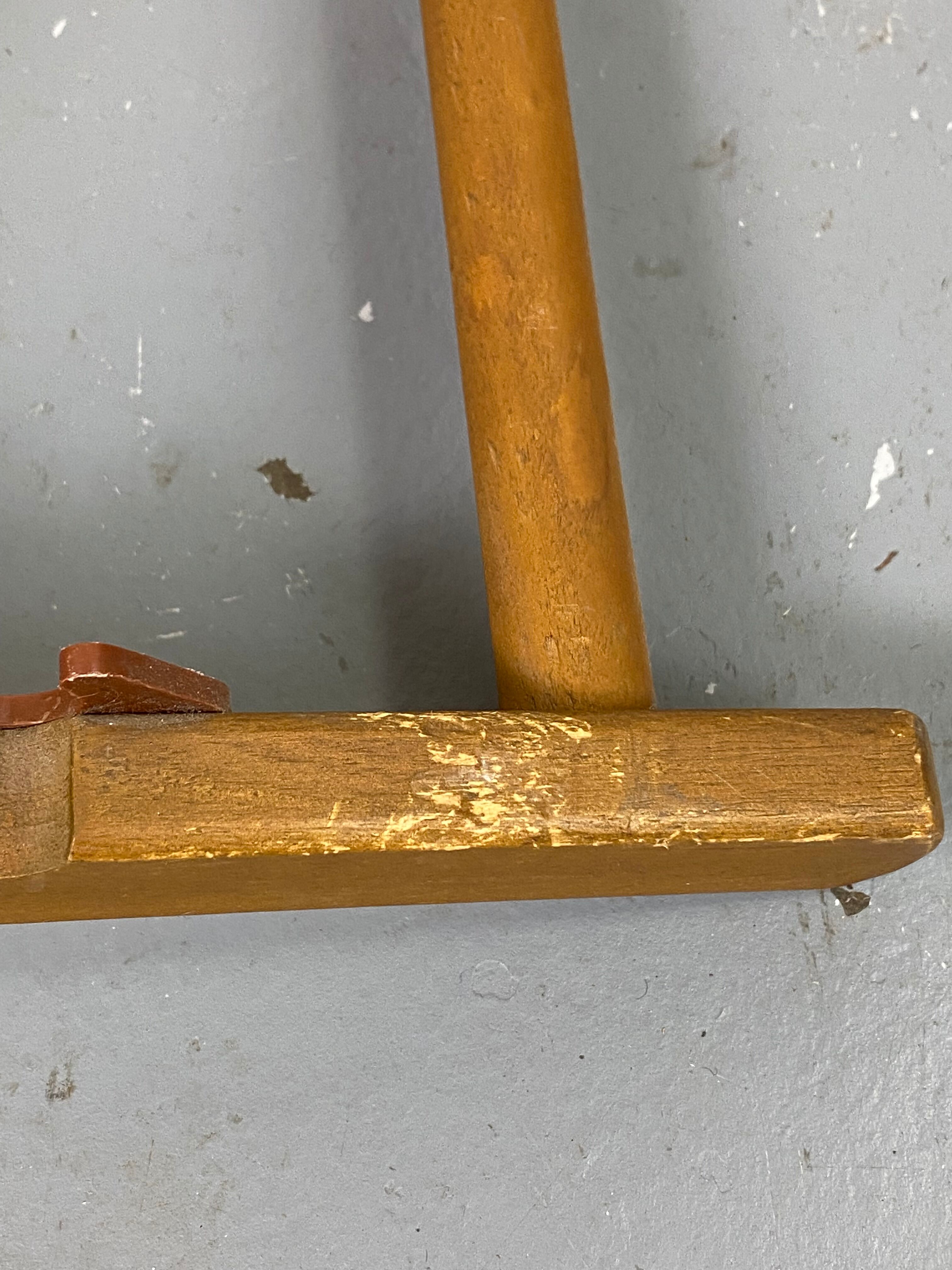 White fabric deckchair with wooden structure