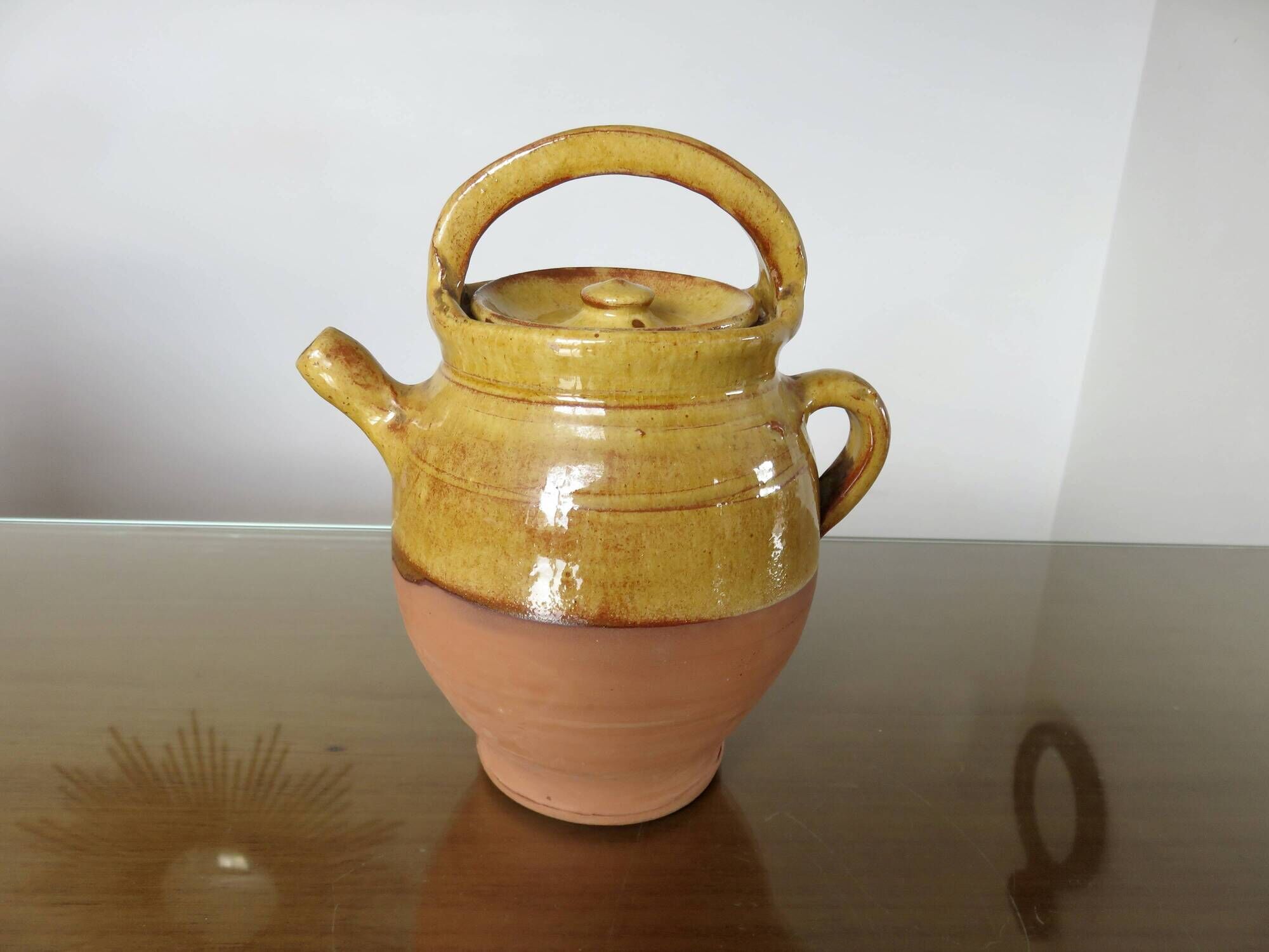 Glazed yellow terracotta jug, south-west of France.