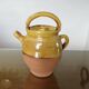 Glazed yellow terracotta jug, south-west of France.