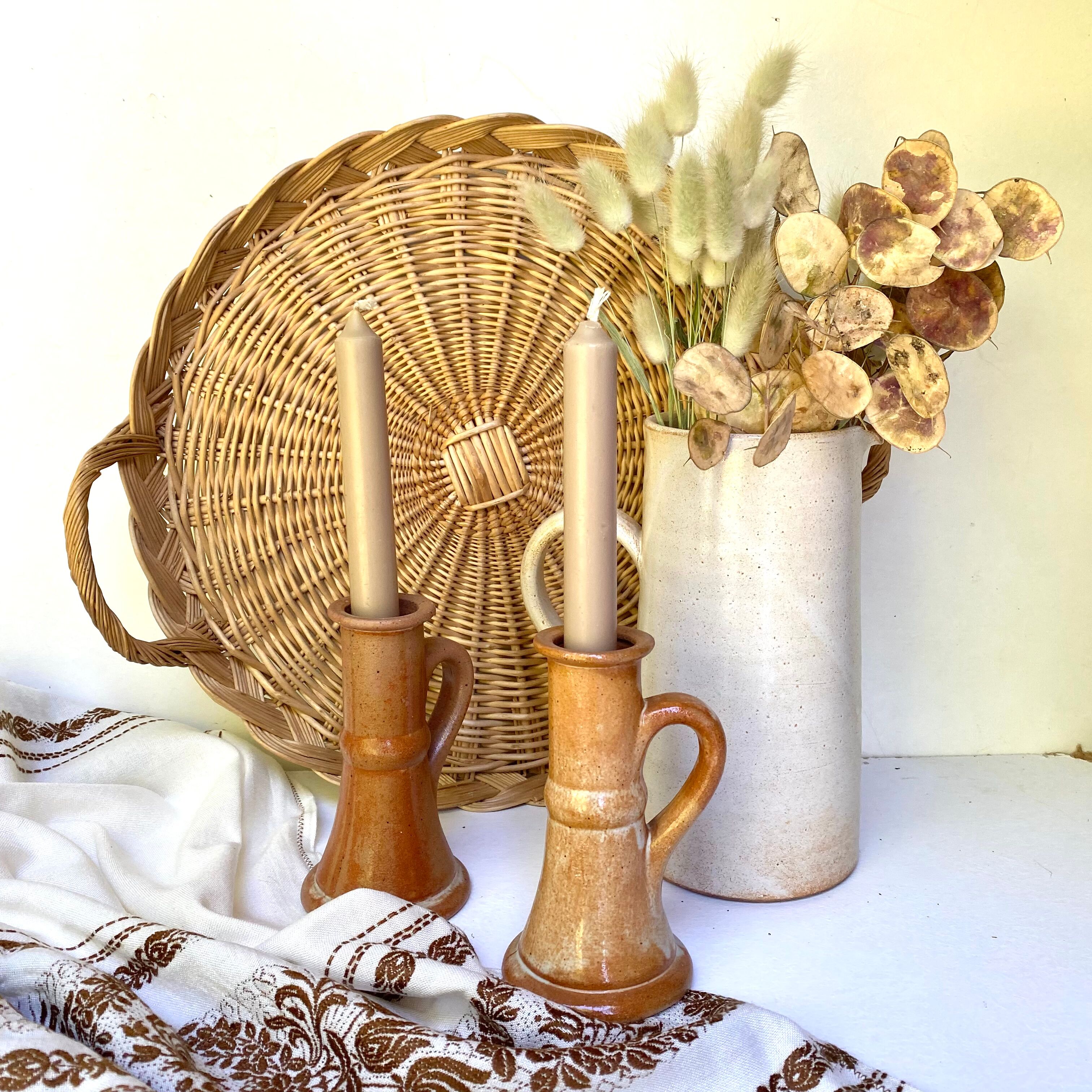 Pair of bohemian sandstone candle holders