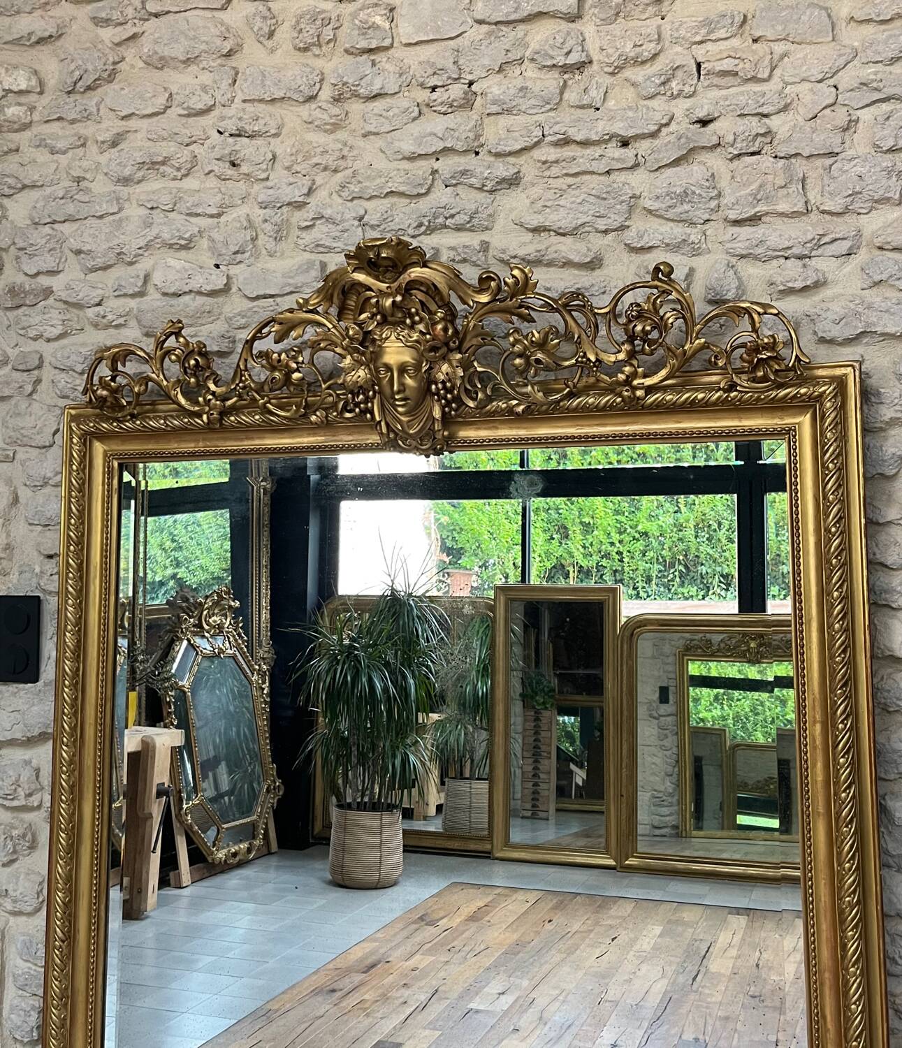 Pedimented mirror 184.5cm/135cm gilded with gold leaf
