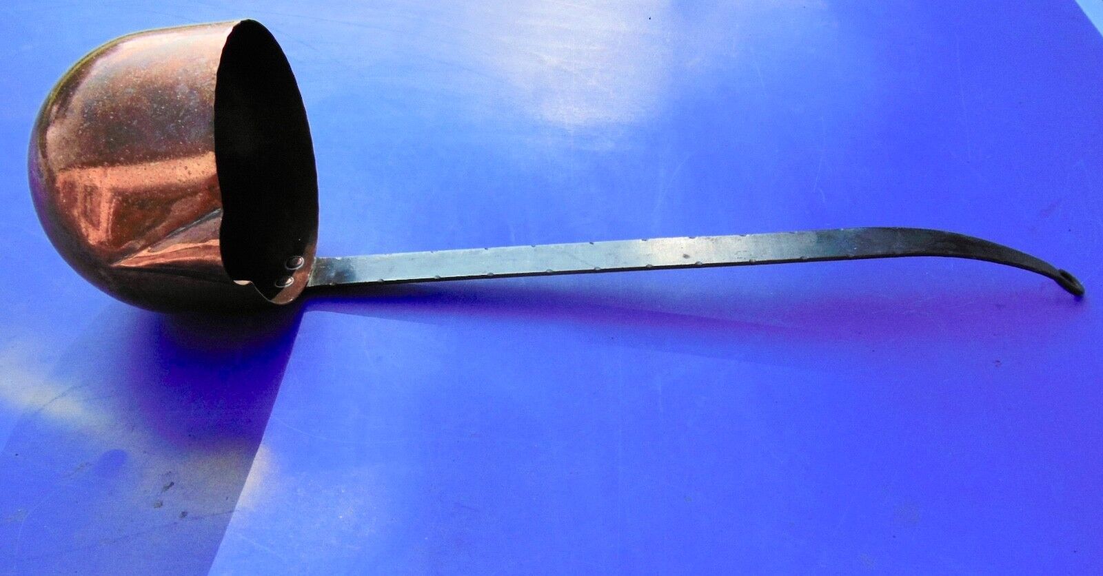 Ladle or old copper measure with spout