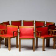A masterpiece of Italian modernism: eleven Aldo Rossi red Teatro arm chairs