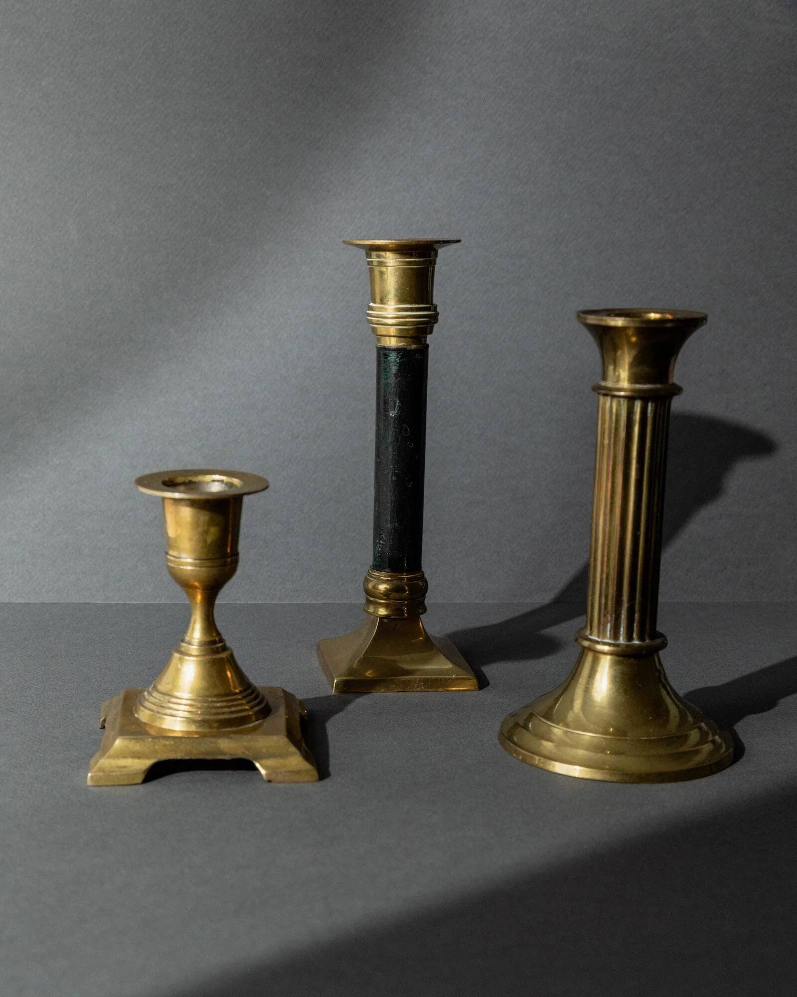 Vintage set of 3 brass candlesticks from the 1940s, various shapes.