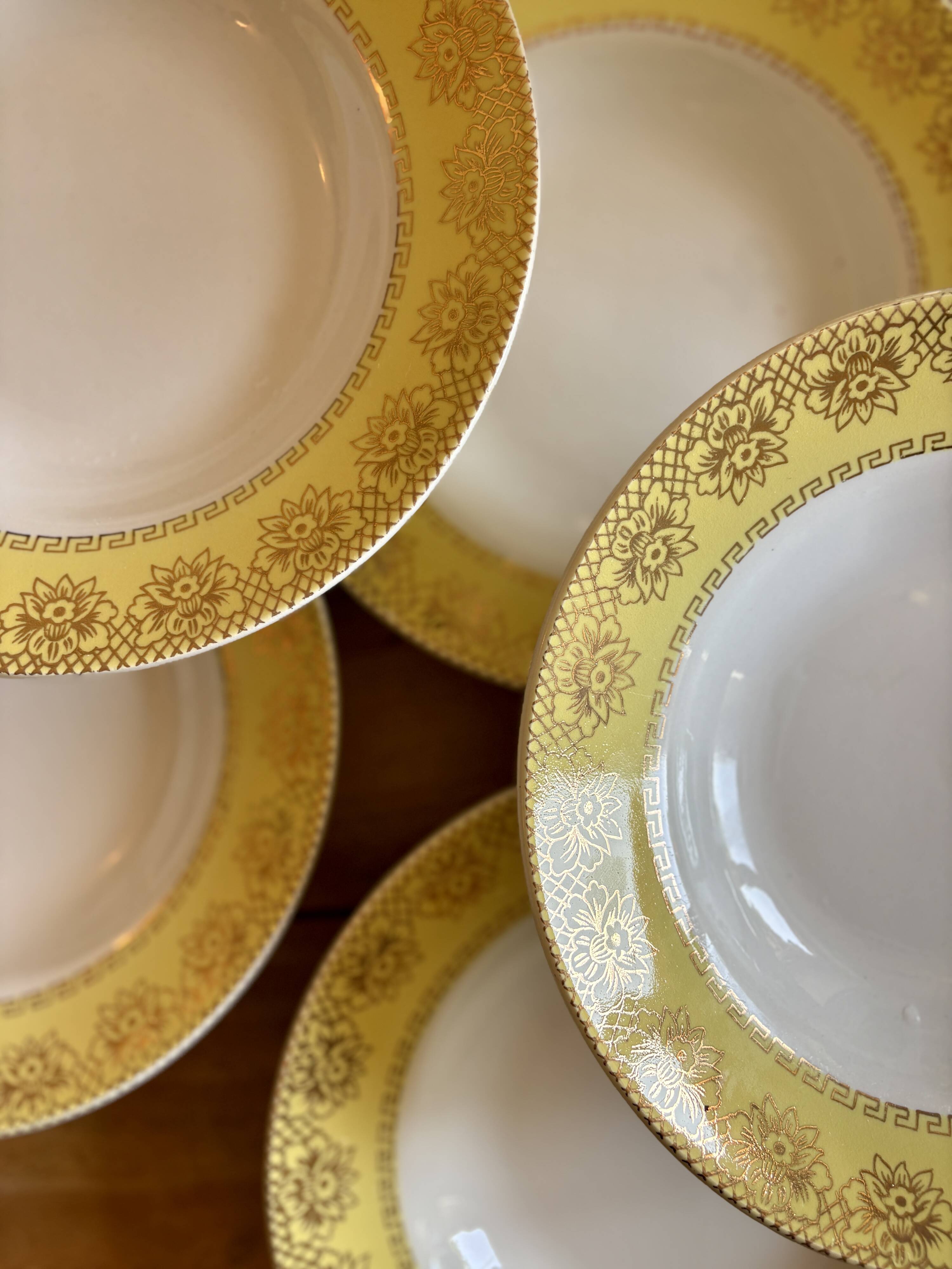 Set of 12 vintage yellow, white and gold soup plates