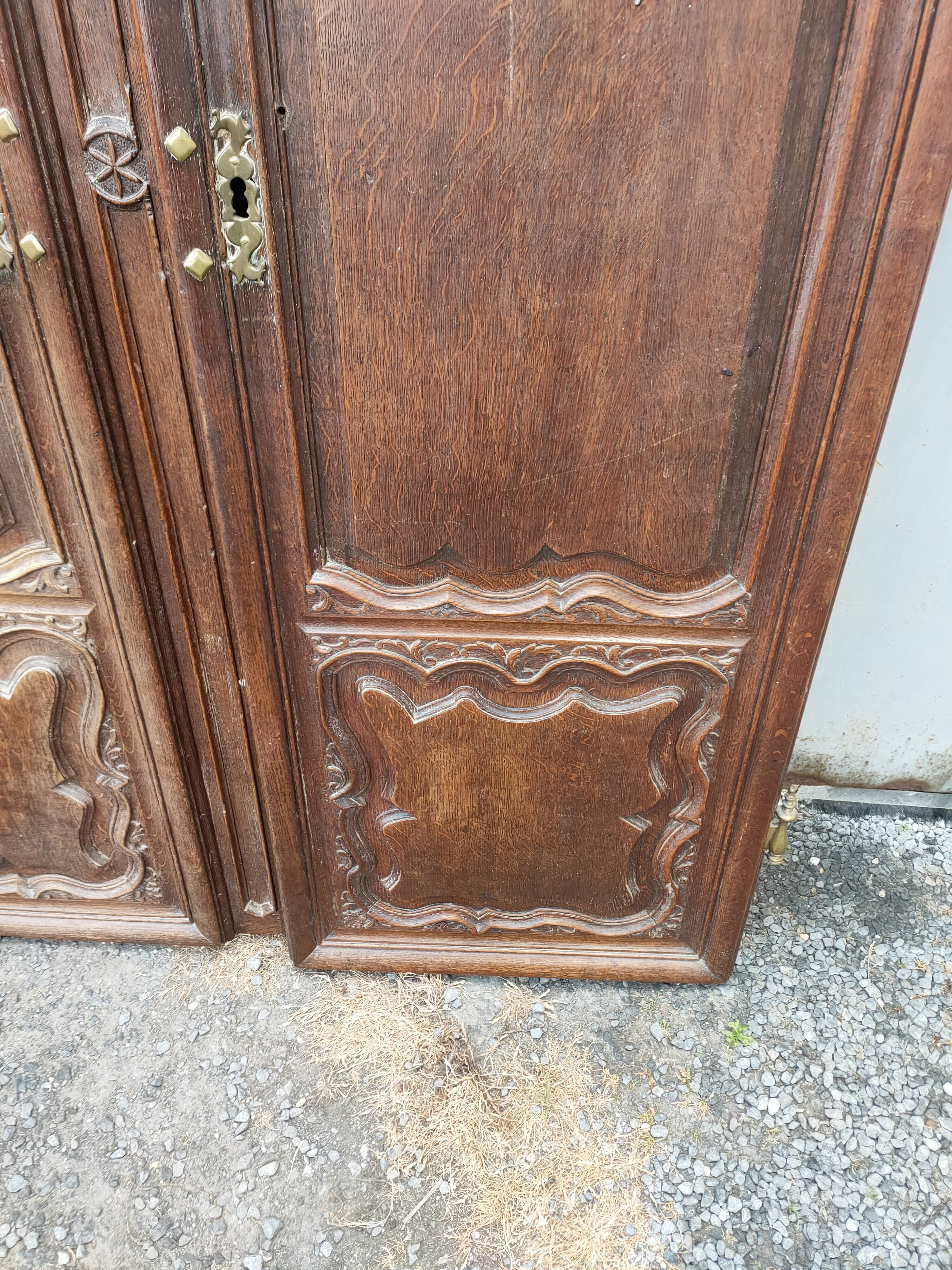 Pair of antique oak wardrobe doors