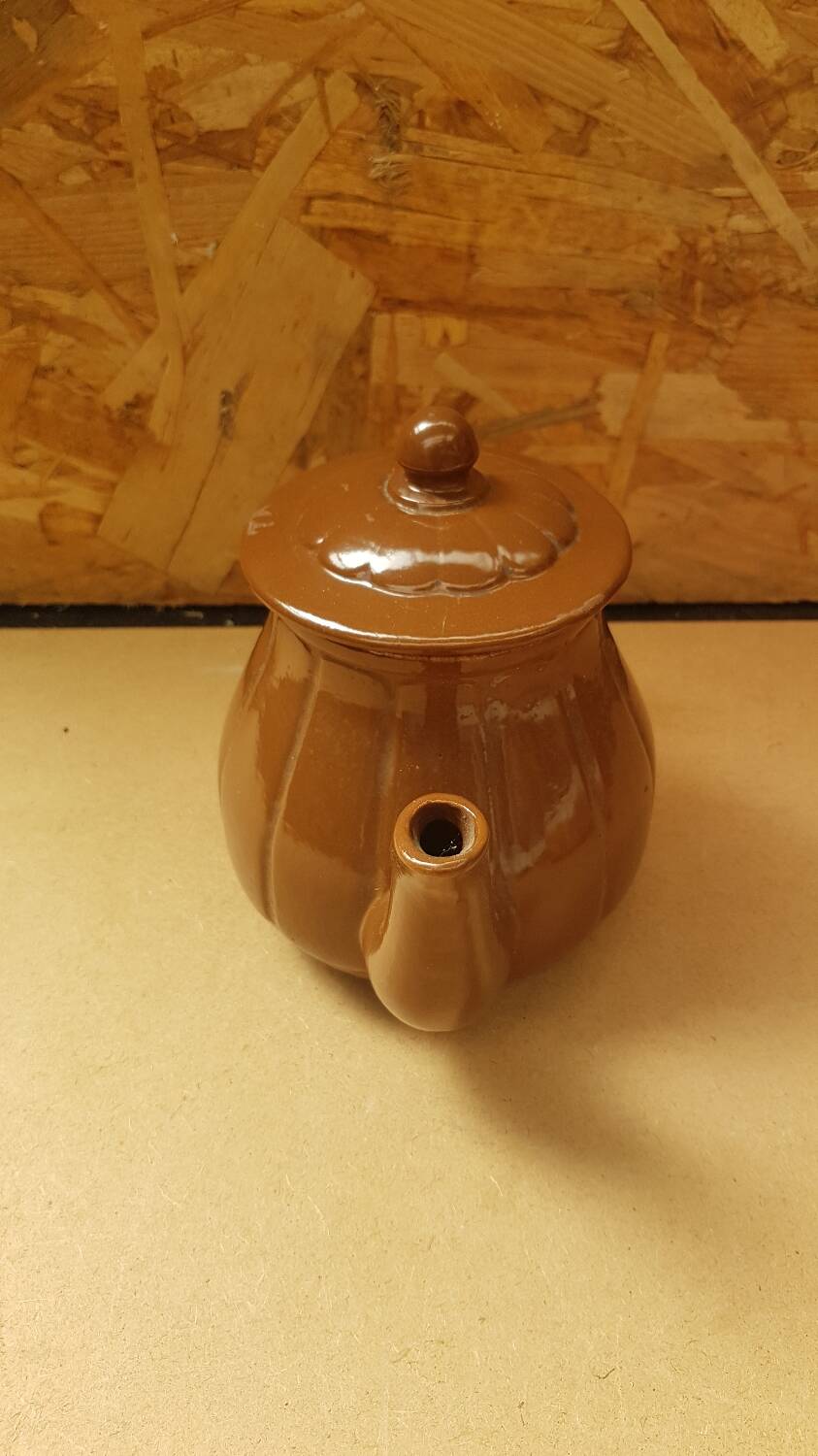 Old vintage brown ceramic romeo teapot
