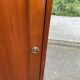 Louis Philippe wardrobe with a solid wood door.