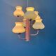 Mid-century opaline glass chandelier with a pink structure.
