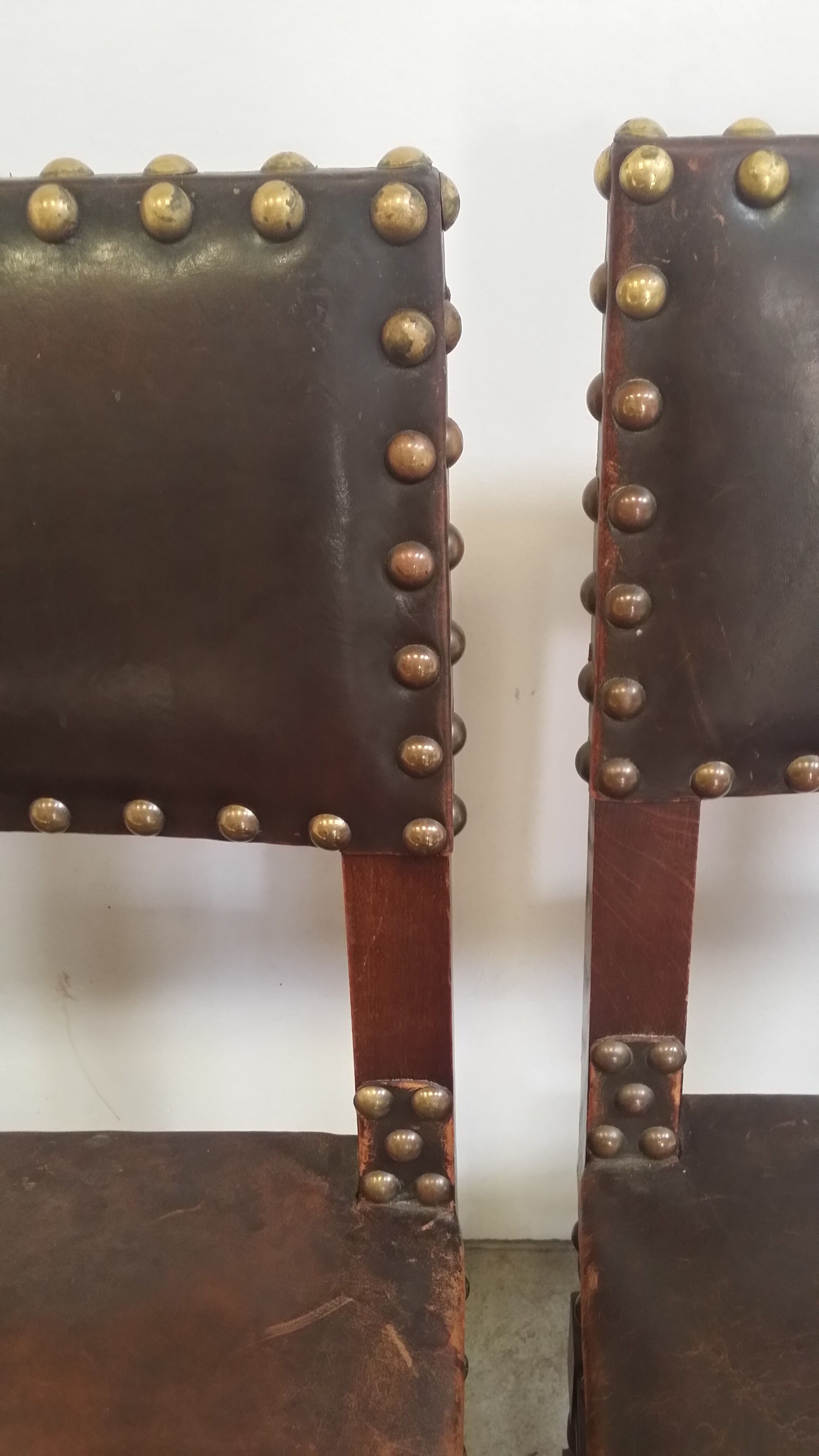 a set of six leather chairs and nails