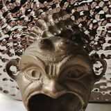 Ashtray/empty pocket devil's satyric head/diablotin, in bronze with golden patina. signed medina iran