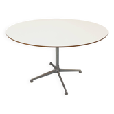 Vintage Eames round table for Vitra in white melamine, wood, and metal.