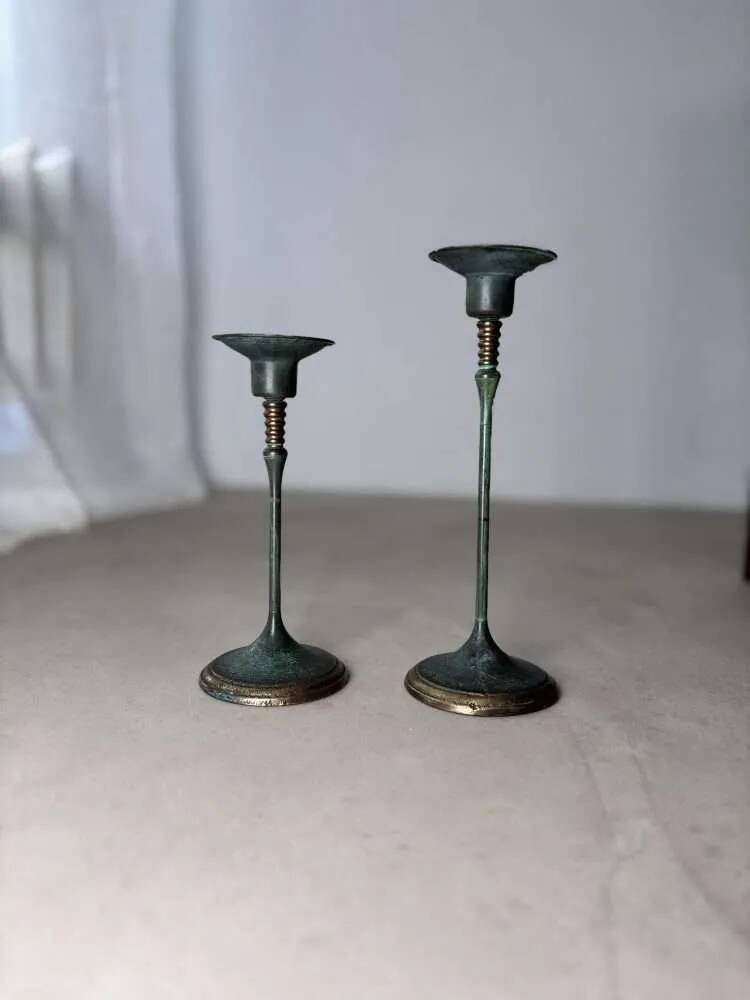 Set of two green bronze Italian candlesticks from the 1980s.