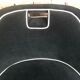 Retro vintage 80's armchair in black velvet with white trim