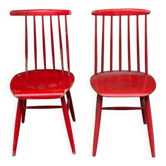 Pair of red solid wood chairs from the 60s
