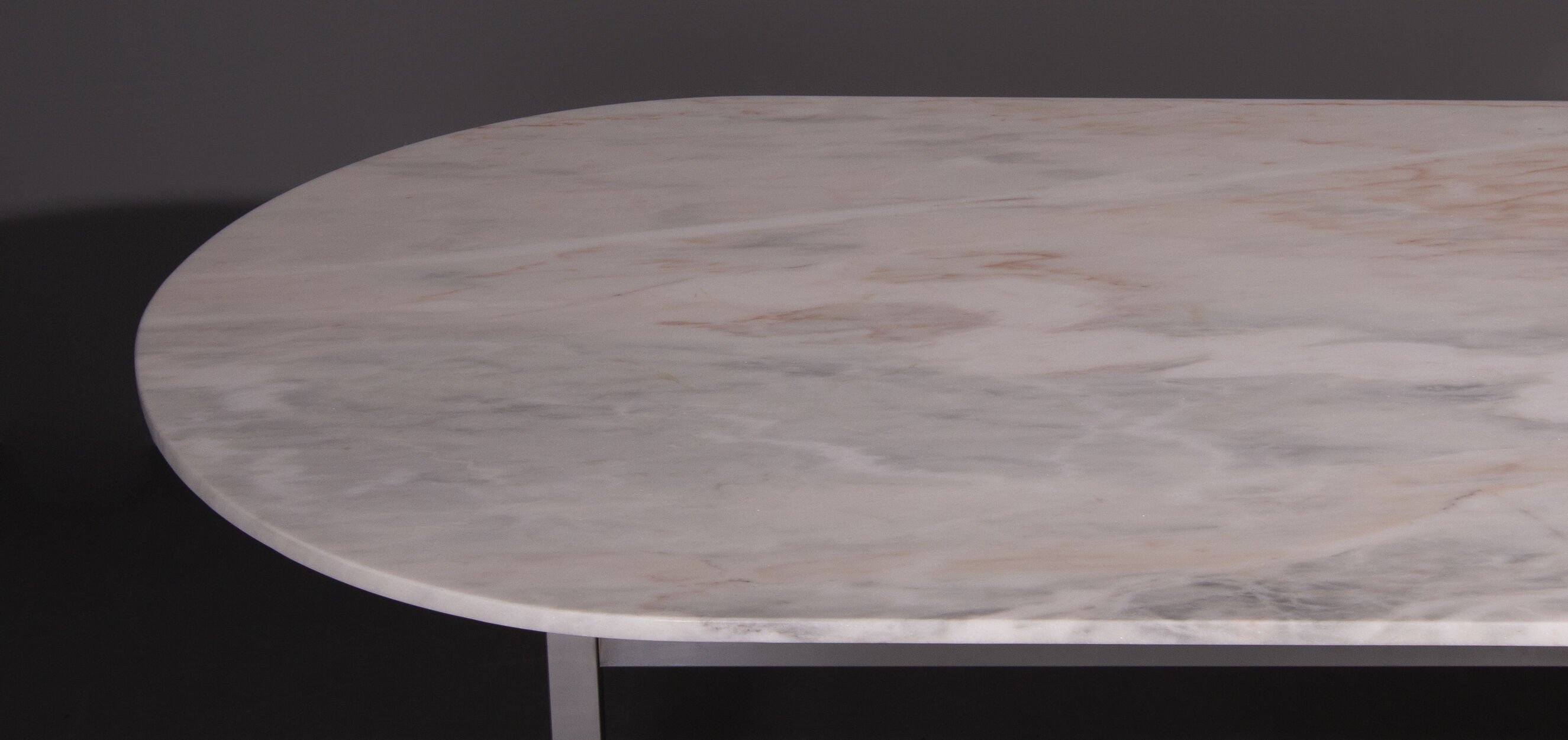 Dining table with oval Carrara marble top