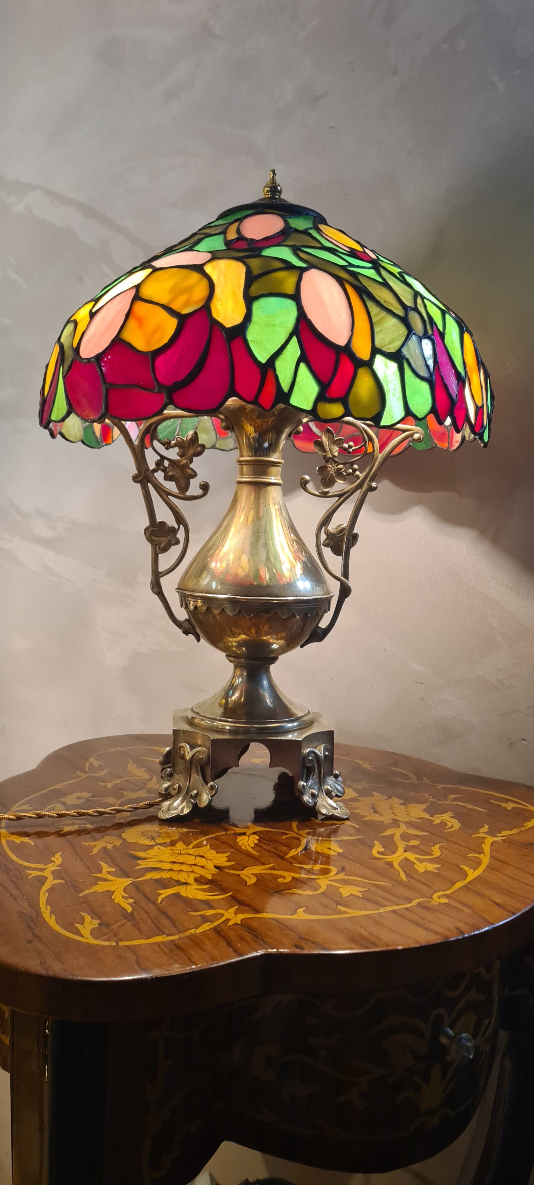 Antique bronze lamp and Tiffany-style stained glass shade. 46x32