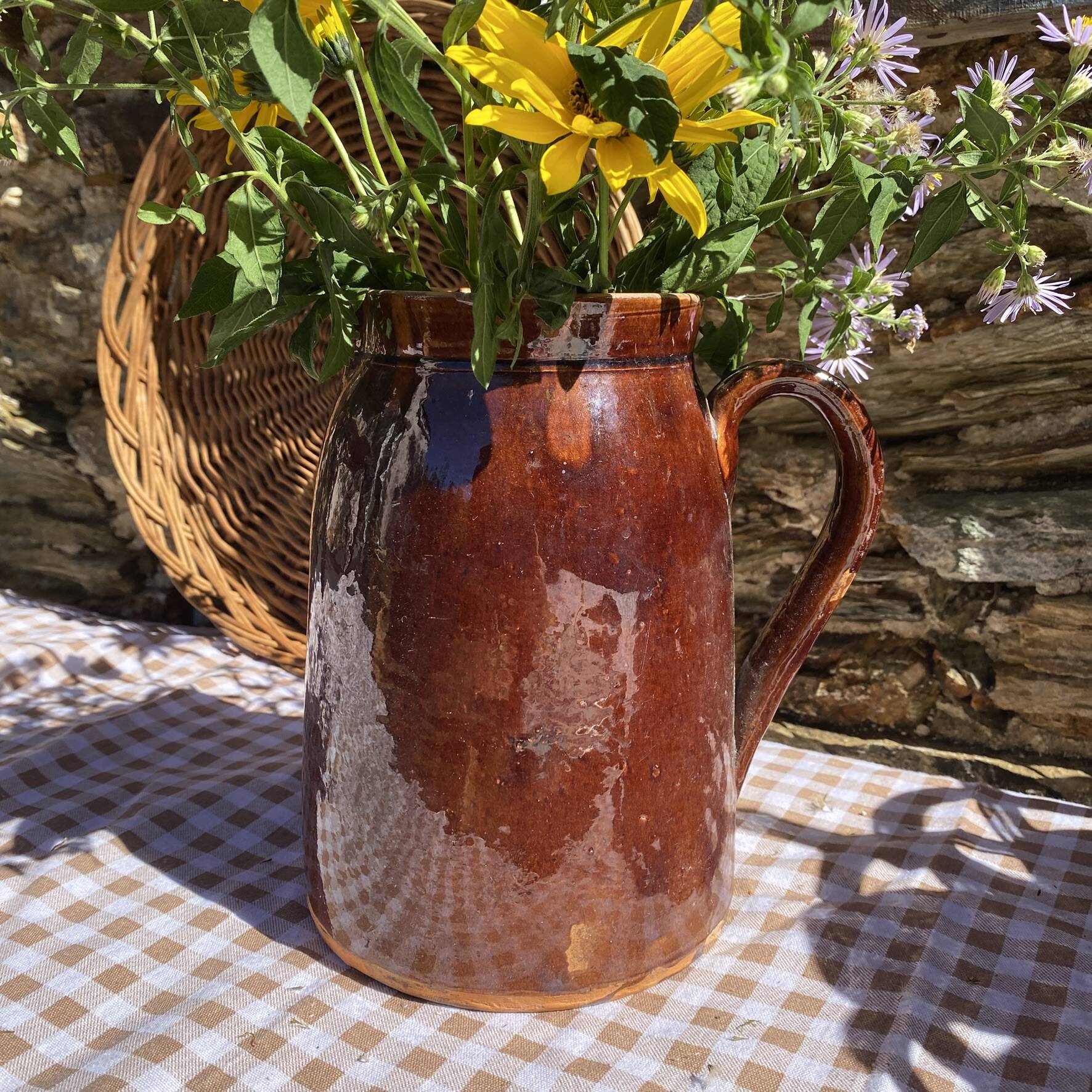 Old glazed terracotta pitcher