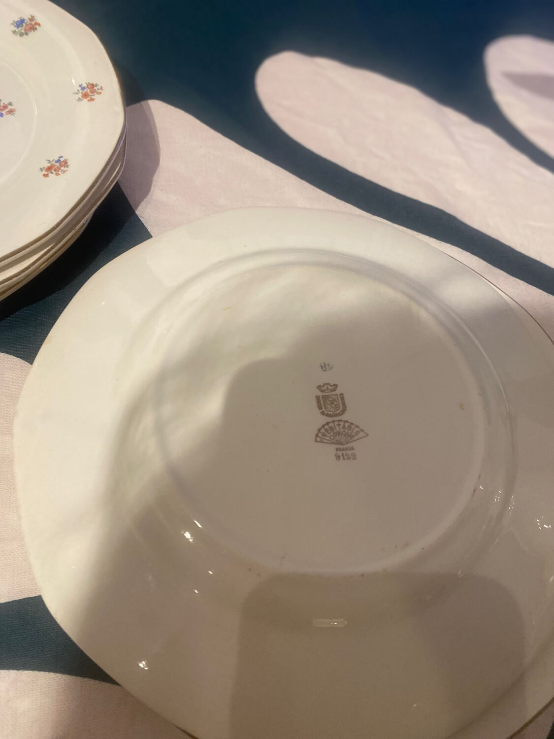 Dessert plate and porcelain dish with a multicoloured floral pattern vintage.