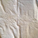 Old sheet in linen embroidered Monogram V M thread.