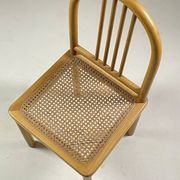 Chaise vintage en bois et cannage