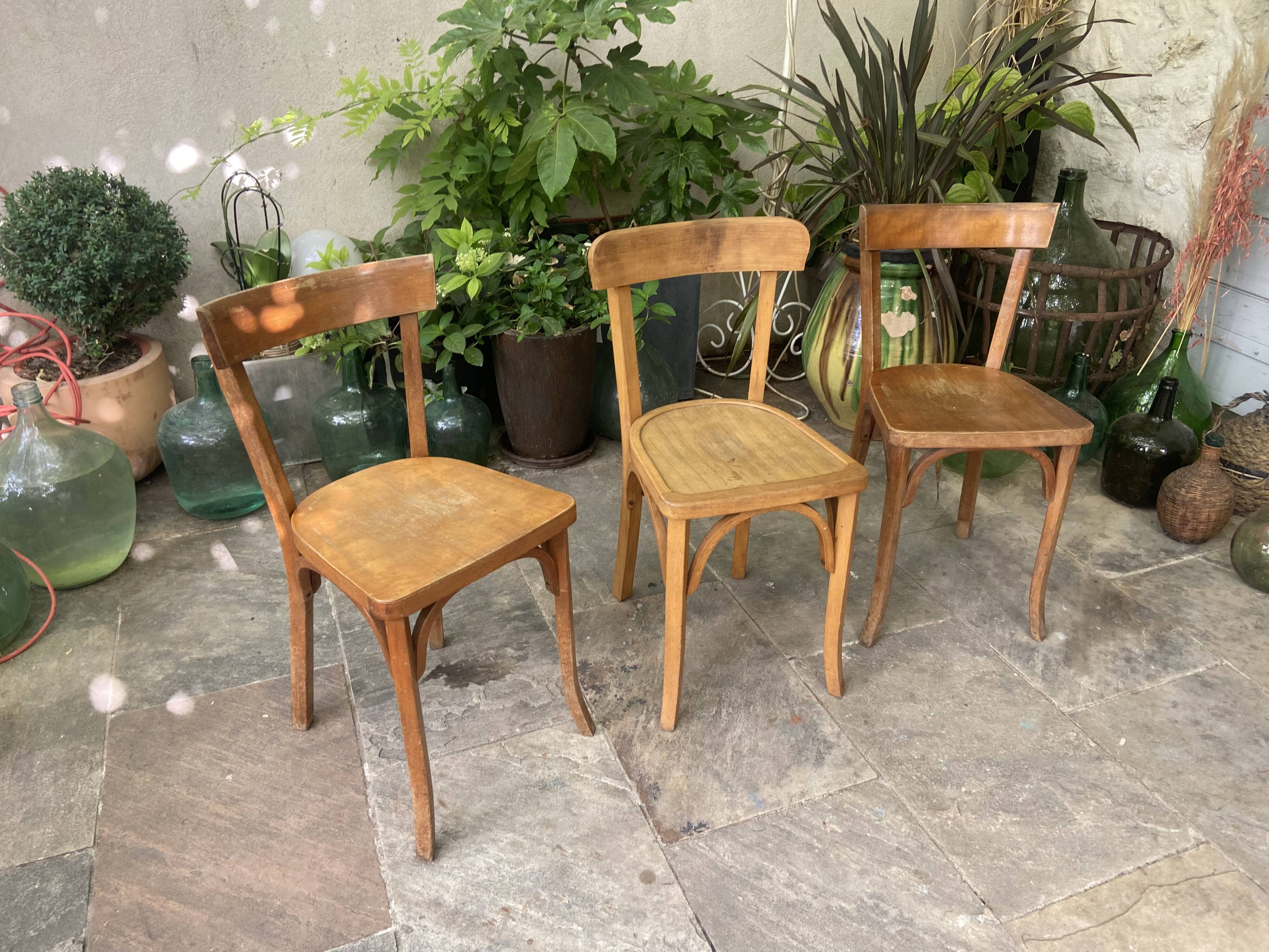 Trio of vintage Bauman bistro chairs