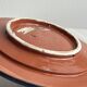 Raised dish, ceramic plate with blue and white patterns.